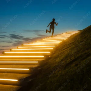 Silhouette of a person running up an illuminated staircase at dusk